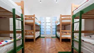 An Inexpensive Accommodation for Each Traveler